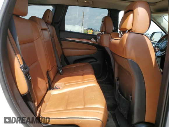 2011 Jeep Grand Cherokee Overland with VIN 1J4RR6GG3BC718723, listed as a Copart auction lot 64975275 with 272,922 mi miles and Salvage title. Bid and sale history available at DreamBid. Image 11.