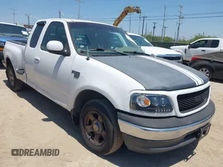 1999 Ford F-150 with VIN 1FTRX07W0XKA01385, listed as a IAAI auction lot 42247809 with 147,105 mi miles and . Bid and sale history available at DreamBid. Image 1.