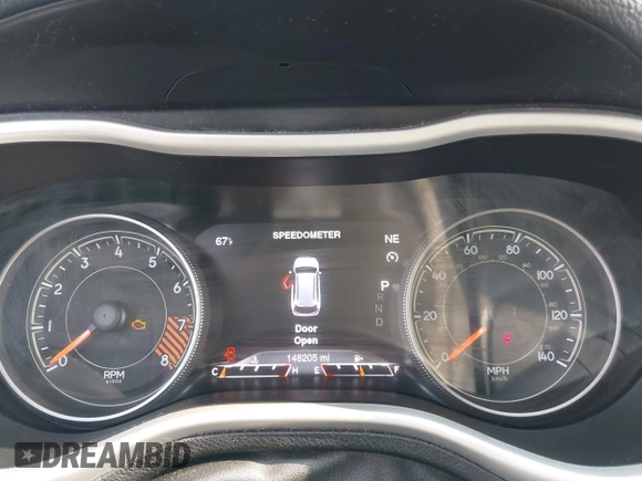 2015 Jeep Cherokee Trailhawk with VIN 1C4PJMBS6FW786622, listed as a IAAI auction lot 42403215 with 148,205 mi miles and . Bid and sale history available at DreamBid. Image 7.