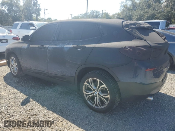 2021 BMW X2 sDrive28i with VIN WBXYH9C01M5T07944, listed as a Copart auction lot 73800944 with 0 mi miles and Salvage Title. Bid and sale history available at carsss.com. Image 2.