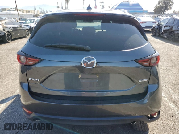 2019 Mazda CX-5 Grand Touring with VIN JM3KFADM2K0665356, listed as a Copart auction lot 51886685 with 44,760 mi miles and Salvage Title. Bid and sale history available at carsss.com. Image 6.