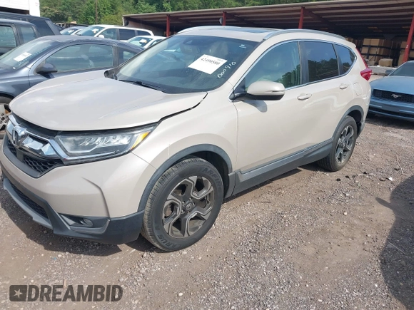 2018 Honda CR-V Touring with VIN 5J6RW2H96JL000910, listed as a IAAI auction lot 42490580 with 201,534 mi miles and . Bid and sale history available at DreamBid. Image 17.