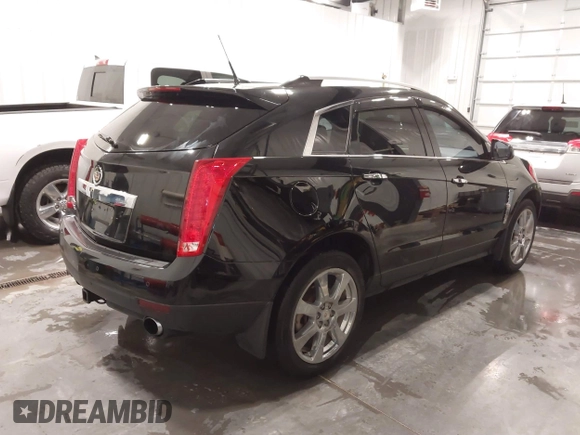 2011 Cadillac SRX Performance Collection with VIN 3GYFNEEY9BS675746, listed as a IAAI auction lot 41735676 with 113,079 mi miles and . Bid and sale history available at carsss.com. Image 4.