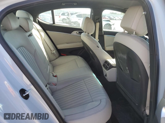 2022 Genesis G70 3.3T with VIN KMTG54TE8NU100556, listed as a Copart auction lot 82680694 with 42,679 mi miles and Salvage Title. Bid and sale history available at carsss.com. Image 10.
