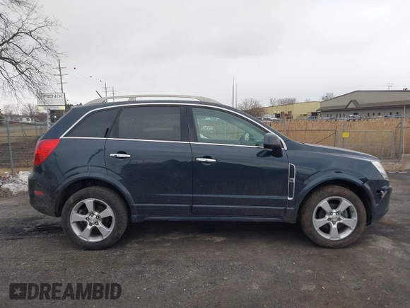2014 Chevrolet Captiva Sport LT z VIN 3GNAL3EK5ES663143, wystawiony jako IAAI lot #41669555 z przebiegiem 99 880 mil mil oraz . Historia ofert i sprzedaży dostępna na DreamBid. Obrazek 13.
