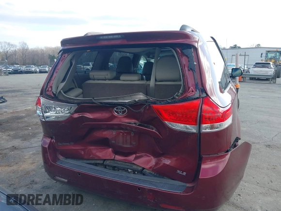 2014 Toyota Sienna XLE with VIN 5TDYK3DCXES442968, listed as a IAAI auction lot 41241310 with 132,020 mi miles and . Bid and sale history available at DreamBid. Image 16.