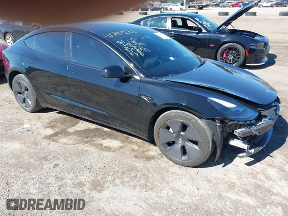 2023 Tesla Model 3 Long Range with VIN 5YJ3E1EB1PF632595, listed as a IAAI auction lot 41754131 with 8,147 mi miles and . Bid and sale history available at DreamBid. Image 1.