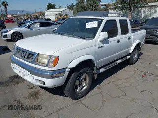 2000 Nissan Frontier XE z VIN 1N6ED27T5YC433357, wystawiony jako IAAI lot #42405160 z przebiegiem 290 620 mil mil oraz . Historia ofert i sprzedaży dostępna na DreamBid. Obrazek 2.
