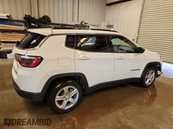 2023 Jeep Compass Latitude with VIN 3C4NJDBNXPT561810, listed as a Copart auction lot 64895215 with 59,166 mi miles and Clean title. Bid and sale history available at DreamBid. Image 3.