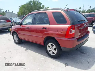 2009 Kia Sportage LX with VIN KNDJE723897599966, listed as a IAAI auction lot 42107627 with 118,512 mi miles. Bid and sale history available at carsss.com. Image 3.