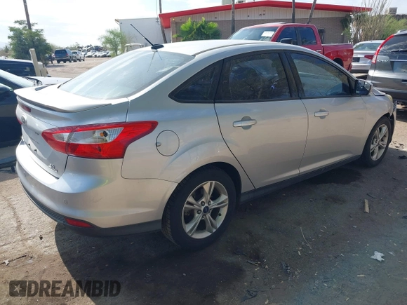 2013 Ford Focus SE with VIN 1FADP3F21DL184625, listed as a IAAI auction lot 42575194 with 113,601 mi miles and . Bid and sale history available at DreamBid. Image 4.