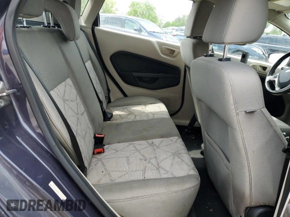 2013 Ford Fiesta SE z VIN 3FADP4EJ8DM146676, wystawiony jako Copart lot #55565485 z przebiegiem 168 801 mil mil oraz Szkoda całkowita • Salvage title. Historia ofert i sprzedaży dostępna na DreamBid. Obrazek 10.