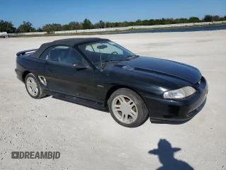 1996 Ford Mustang GT with VIN 1FALP45X3TF204806, listed as a Copart auction lot 84204974 with 137,676 mi miles and Salvage Title. Bid and sale history available at carsss.com. Image 4.