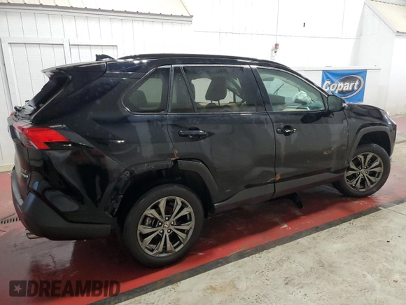 2023 Toyota RAV4 Hybrid XLE Premium with VIN 4T3B6RFV4PU121604, listed as a Copart auction lot 49998145 with 52,573 mi miles and Salvage Title. Bid and sale history available at carsss.com. Image 3.
