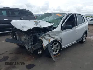 2000 Toyota ECHO z VIN JTDBT1234Y0075812, wystawiony jako IAAI lot #42203000 z przebiegiem Nie podano mil oraz . Historia ofert i sprzedaży dostępna na DreamBid. Obrazek 6.
