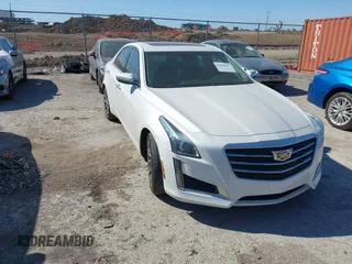 2016 Cadillac CTS with VIN 1G6AR5SS1G0112728, listed as a IAAI auction lot 41830547 with 100,610 mi miles and . Bid and sale history available at DreamBid. Image 1.