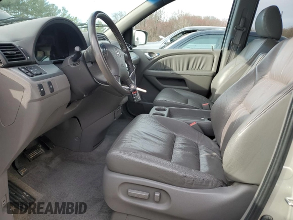 2009 Honda Odyssey EX-L with VIN 5FNRL38609B019428, listed as a Copart auction lot 49585665 with 180,843 mi miles and Salvage Title. Bid and sale history available at carsss.com. Image 7.