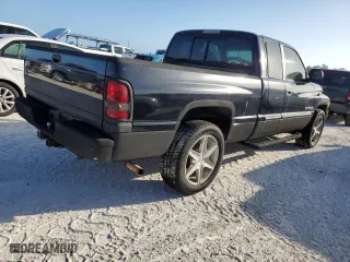 2000 Dodge Ram 1500 with VIN 1B7HC13Z7YJ122323, listed as a Copart auction lot 77254054 with 0 mi miles and Non Repairable. Bid and sale history available at carsss.com. Image 3.