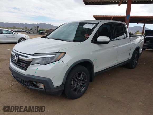 2019 Honda Ridgeline Sport with VIN 5FPYK3F10KB044218, listed as a IAAI auction lot 41907044 with 151,887 mi miles and . Bid and sale history available at DreamBid. Image 2.