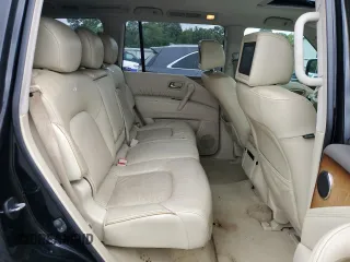 2011 Infiniti QX56 8-passenger с VIN JN8AZ2ND9B9701754, выставлен на аукционе Copart как лот 57916715 с пробегом 216 613 миль миль и Чистый • Clean title. История ставок и продаж доступна на DreamBid. Изображение 11.