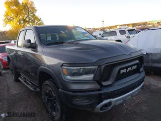 2019 Ram 1500 Rebel with VIN 1C6RRFEG6KN860990, listed as a IAAI auction lot 40904536 with 121,670 mi miles. Bid and sale history available at carsss.com. Image 1.
