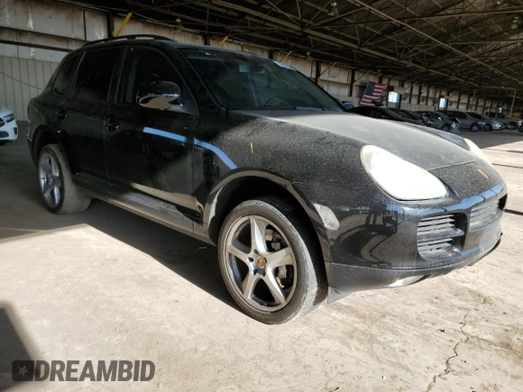 2006 Porsche Cayenne S with VIN WP1AB29P56LA66639, listed as a Copart auction lot 52097595 with 180,827 mi miles and Salvage title. Bid and sale history available at DreamBid. Image 4.