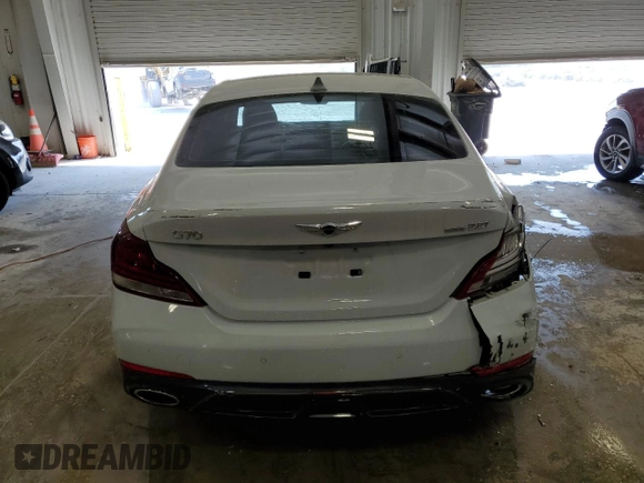 2020 Genesis G70 3.3T with VIN KMTG34LE6LU048573, listed as a Copart auction lot 67907884 with 63,531 mi miles and Salvage Title. Bid and sale history available at carsss.com. Image 6.