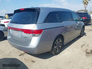 2016 Honda Odyssey Touring Elite with VIN 5FNRL5H90GB139183, listed as a IAAI auction lot 41534324 with 93,807 mi miles. Bid and sale history available at carsss.com. Image 4.