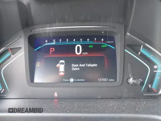 2018 Honda Odyssey EX-L with VIN 5FNRL6H77JB101803, listed as a IAAI auction lot 41927622 with 147,587 mi miles. Bid and sale history available at carsss.com. Image 7.