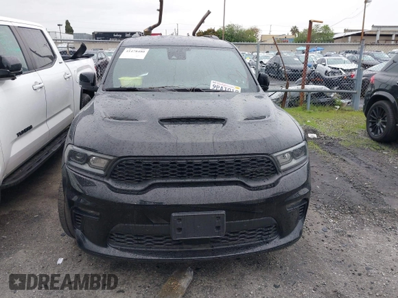 2023 Dodge Durango SRT 392 Premium with VIN 1C4SDJGJ6PC557943, listed as a IAAI auction lot 41478480 with 13,733 mi miles and . Bid and sale history available at DreamBid. Image 13.