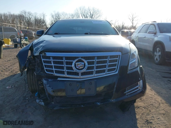 2015 Cadillac XTS Luxury with VIN 2G61N5S34F9226182, listed as a IAAI auction lot 41554394 with 119,194 mi miles. Bid and sale history available at carsss.com. Image 11.