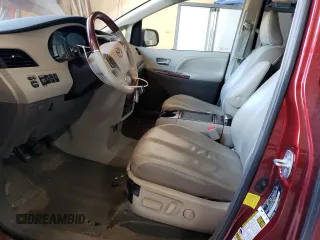 2012 Toyota Sienna XLE AAS with VIN 5TDYK3DC5CS187675, listed as a Copart auction lot 55211635 with 328,972 mi miles and Clean Title. Bid and sale history available at DreamBid. Image 7.