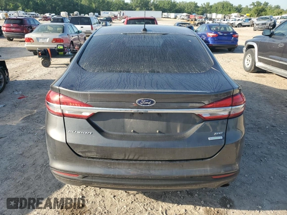 2017 Ford Fusion SE z VIN 3FA6P0HD6HR156834, wystawiony jako Copart lot #55144955 z przebiegiem 114 497 mil mil oraz Szkoda całkowita • Salvage title. Historia ofert i sprzedaży dostępna na DreamBid. Obrazek 6.
