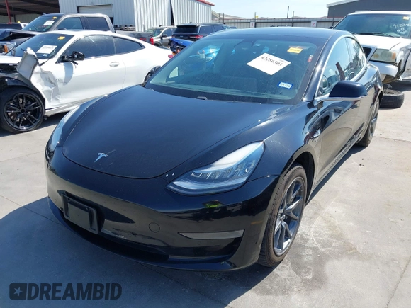 2020 Tesla Model 3 Standard Range Plus z VIN 5YJ3E1EA3LF611152, wystawiony jako IAAI lot #42256503 z przebiegiem 78 633 mil mil oraz . Historia ofert i sprzedaży dostępna na DreamBid. Obrazek 2.