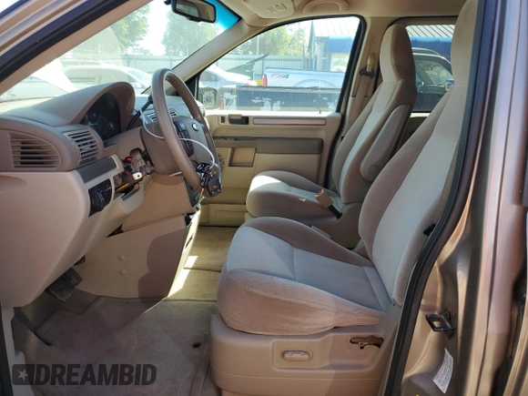 2006 Ford Freestar SE z VIN 2FMZA51696BA52749, wystawiony jako Copart lot #73174604 z przebiegiem 288 365 mil mil oraz Szkody całkowita. Historia ofert i sprzedaży dostępna na DreamBid. Obrazek 7.