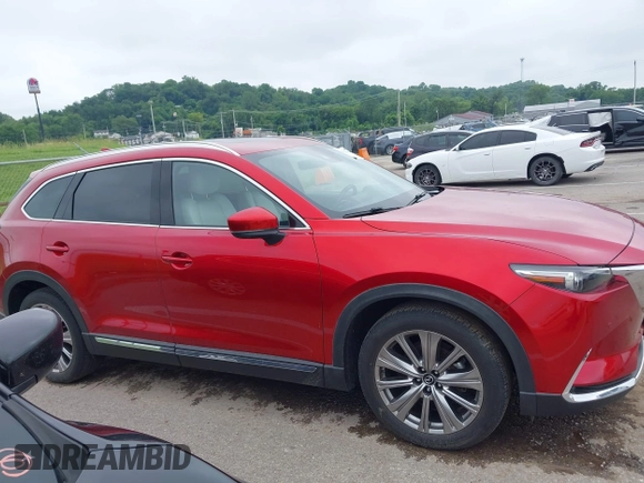 2021 Mazda CX-9 Signature with VIN JM3TCBEY9M0511928, listed as a IAAI auction lot 42231925 with 26,367 mi miles and . Bid and sale history available at DreamBid. Image 13.