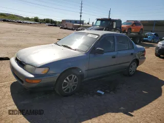 1994 Toyota Corolla z VIN 1NXAE04B7RZ129212, wystawiony jako Copart lot #56760095 z przebiegiem 156 822 mil mil oraz Czysty tytuł • Clean title. Historia ofert i sprzedaży dostępna na DreamBid. Obrazek 1.