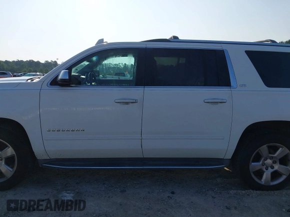2016 Chevrolet Suburban LTZ with VIN 1GNSCJKC9GR236530, listed as a IAAI auction lot 42387868 with 185,159 mi miles and . Bid and sale history available at DreamBid. Image 14.