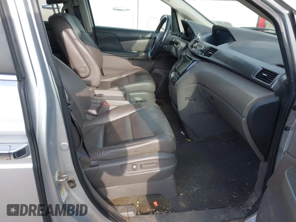 2014 Honda Odyssey EX-L with VIN 5FNRL5H62EB101392, listed as a IAAI auction lot 42689945 with 289,242 mi miles and . Bid and sale history available at DreamBid. Image 5.