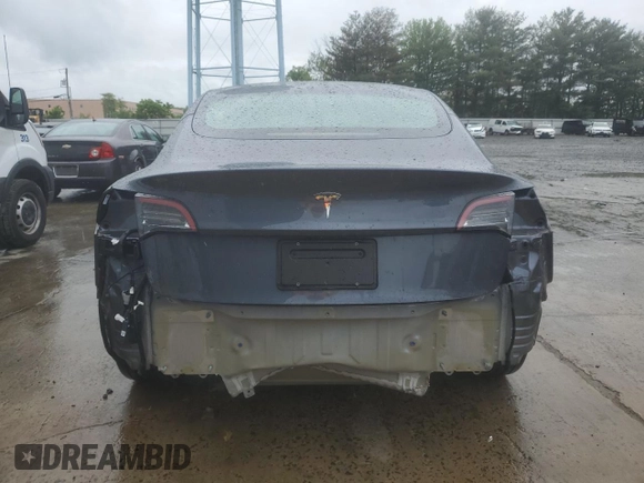 2023 Tesla Model 3 z VIN 5YJ3E1EA9PF699744, wystawiony jako Copart lot #56407215 z przebiegiem 5 201 mil mil oraz Szkoda całkowita • Salvage title. Historia ofert i sprzedaży dostępna na DreamBid. Obrazek 6.