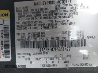 2015 Ford Mustang EcoBoost z VIN 1FA6P8TH7F5351477, wystawiony jako IAAI lot #41378347 z przebiegiem 104 755 mil mil oraz . Historia ofert i sprzedaży dostępna na DreamBid. Obrazek 9.