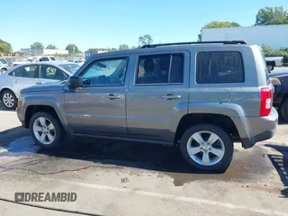 2013 Jeep Patriot Latitude with VIN 1C4NJPFB7DD254744, listed as a IAAI auction lot 40540820 with 129,465 mi miles and . Bid and sale history available at carsss.com. Image 14.