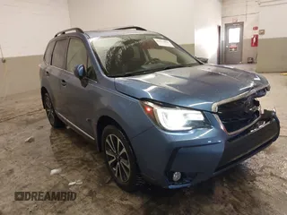 2017 Subaru Forester Touring with VIN JF2SJGTC9HH410251, listed as a IAAI auction lot 41411079 with 131,220 mi miles and . Bid and sale history available at DreamBid. Image 1.
