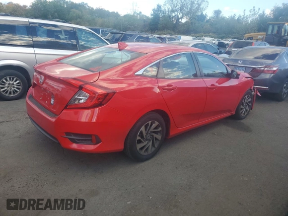 2018 Honda Civic EX with VIN 2HGFC2F74JH530701, listed as a Copart auction lot 74676554 with 69,624 mi miles and Salvage Title. Bid and sale history available at DreamBid. Image 3.