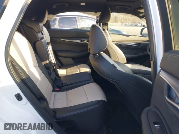 2023 Infiniti QX55 Luxe z VIN 3PCAJ5JR4PF122349, wystawiony jako IAAI lot #40942246 z przebiegiem 12 604 mil mil oraz . Historia ofert i sprzedaży dostępna na DreamBid. Obrazek 8.