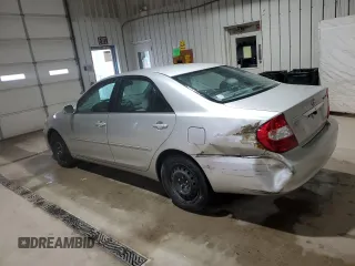 2002 Toyota Camry LE z VIN 4T1BE32K32U063577, wystawiony jako Copart lot #58782185 z przebiegiem 243 589 mil mil oraz Szkoda całkowita • Salvage title. Historia ofert i sprzedaży dostępna na DreamBid. Obrazek 2.