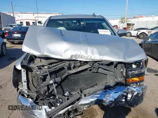 2018 Chevrolet Silverado 1500 LT with VIN 1GCRCREC0JZ212383, listed as a IAAI auction lot 41749534 with 45,777 mi miles and . Bid and sale history available at DreamBid. Image 13.