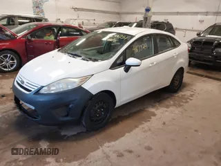 2012 Ford Fiesta S with VIN 3FADP4AJ9CM140647, listed as a IAAI auction lot 41633251 with 117,309 mi miles. Bid and sale history available at carsss.com. Image 2.