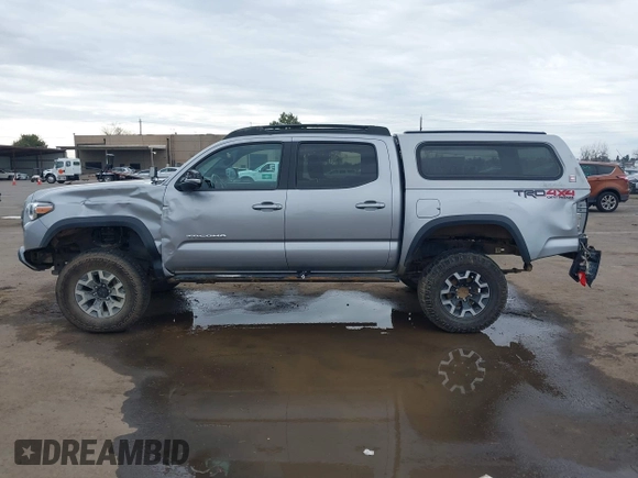 2017 Toyota Tacoma SR5 with VIN 3TMCZ5AN8HM051829, listed as a IAAI auction lot 41616329 with 64,113 mi miles and . Bid and sale history available at DreamBid. Image 14.