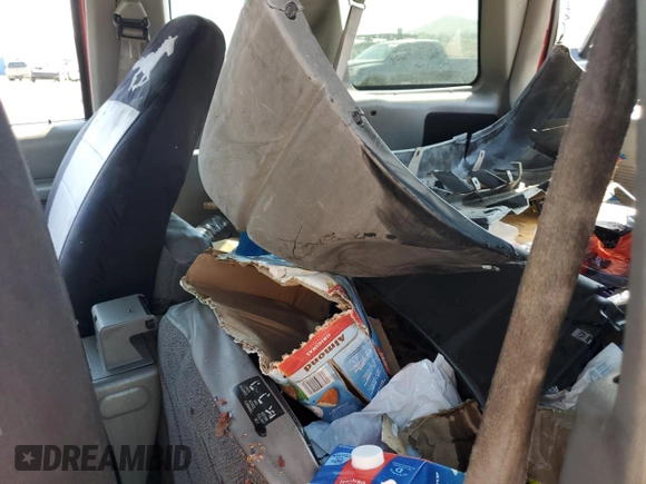 1999 Ford Explorer z VIN 1FMYU22E7XUB19528, wystawiony jako Copart lot #72772864 z przebiegiem 153 581 mil mil oraz Szkoda całkowita • Salvage title. Historia ofert i sprzedaży dostępna na DreamBid. Obrazek 11.